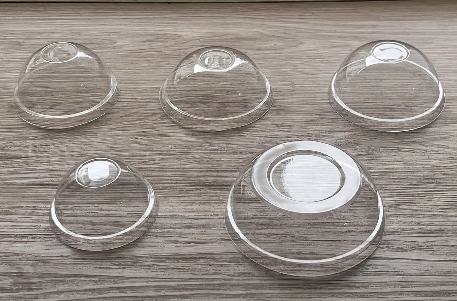 Real photo of transparent clear compostable PLA dome lids