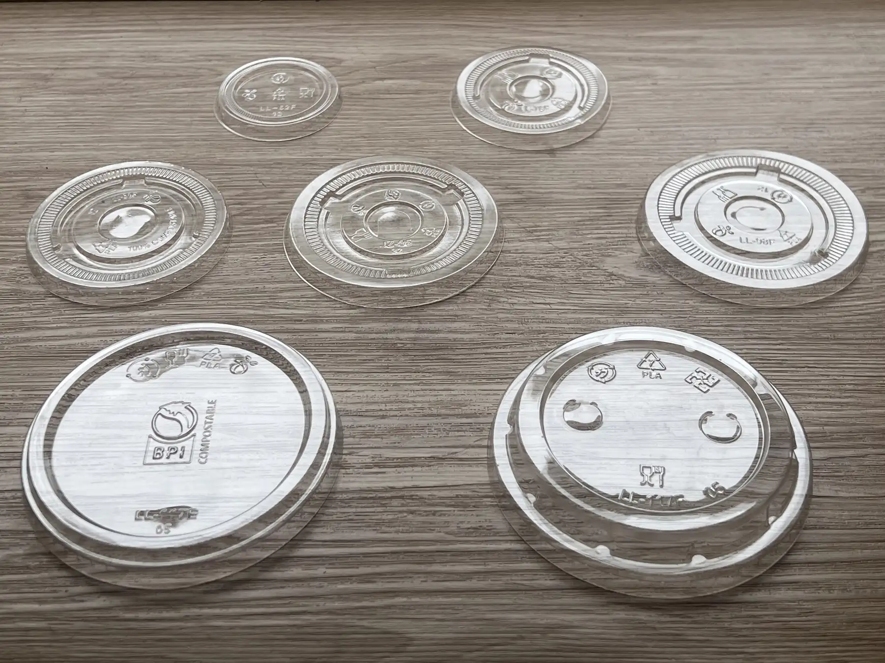 Real product display of transparent clear PLA flat lids
